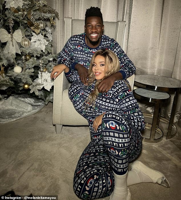 Melanie and goalkeeper Onana pictured wearing matching pyjamas in December last year