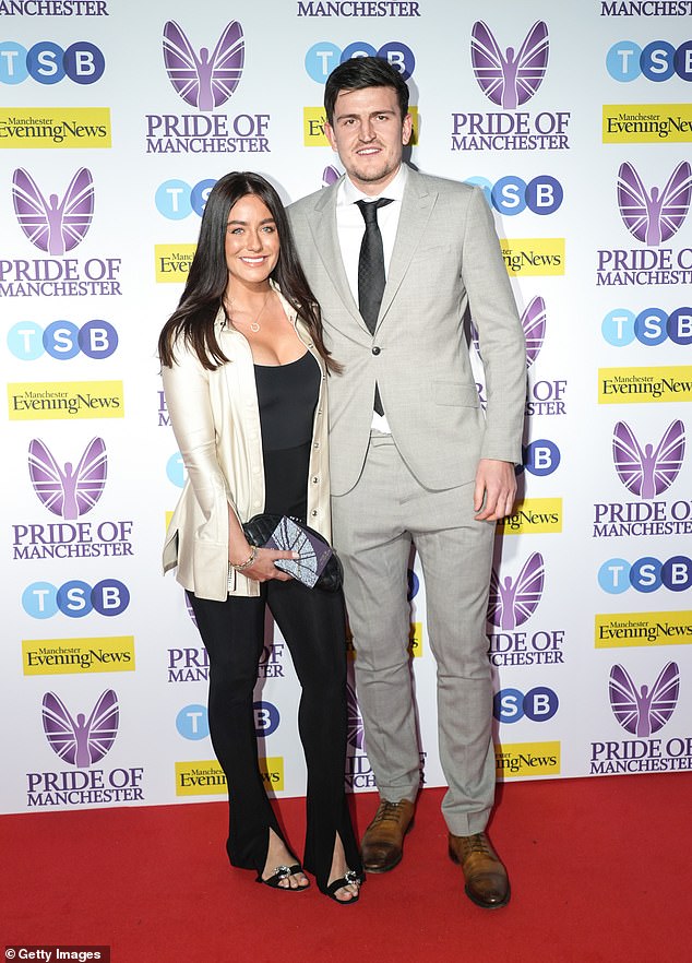 Harry Maguire and wife Fern Hawkins pictured last year at the Pride Of Manchester awards