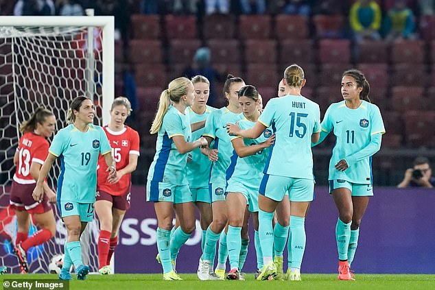 Caitlin Foord of Australia celebrating her goal with her teammates in the draw with Switzerland