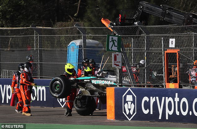 His Mercedes had to be lifted off the track after he lost control of it in second practice