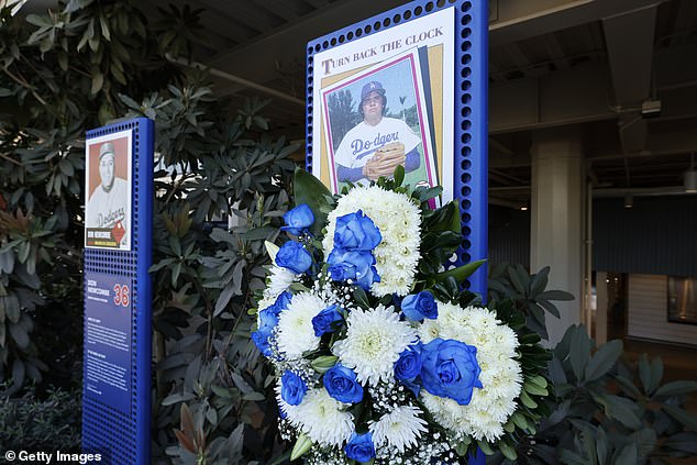 A blue and white wreath was hung on a plaque of the former Dodgers pitcher