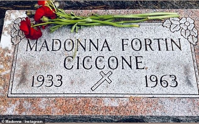 The singer left red roses and stopped by her mother's, Madonna Fortin Ciccone, grave