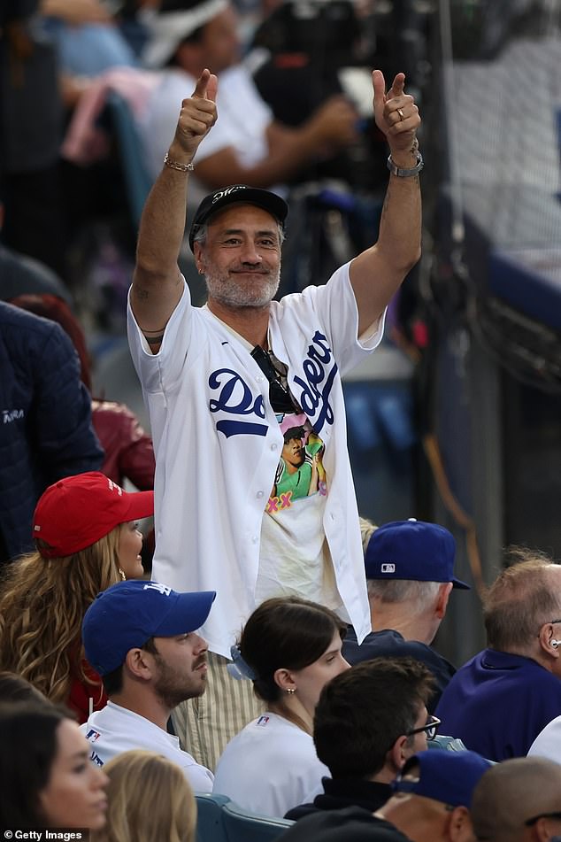 The Jojo Rabbit filmmaker was decked head to toe in Dodgers merchandise for the showdown