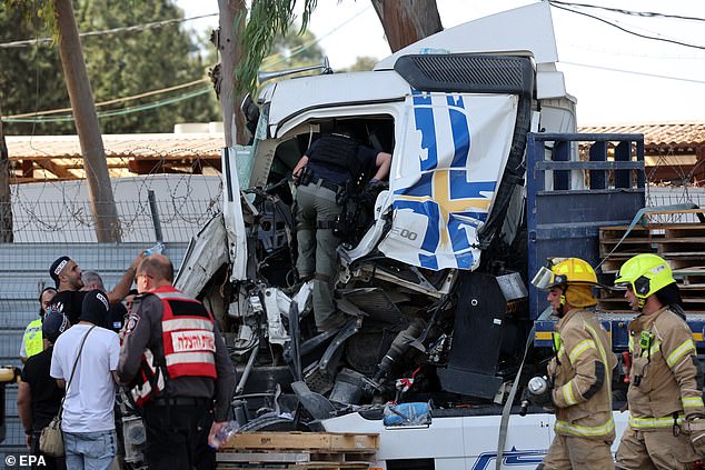 Israeli police investigate at the scene of a truck ramming outside Glilot military base near Tel Aviv, Israel, 27 October 2024