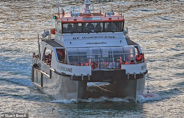 Border Force officials escort migrants into Dover Docks in Kent, United Kingdom on October 25, 2024