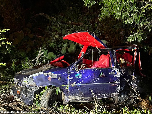 Paramedics found Whalley's modified blue Isuzu with red leather seats severely damaged in a ditch on a bend in the road in Nakhon Si Thammarat, southern Thailand