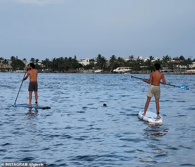 The jiu-jitsu instructor is pictured paddleboarding with Bundchen's son Benjamin