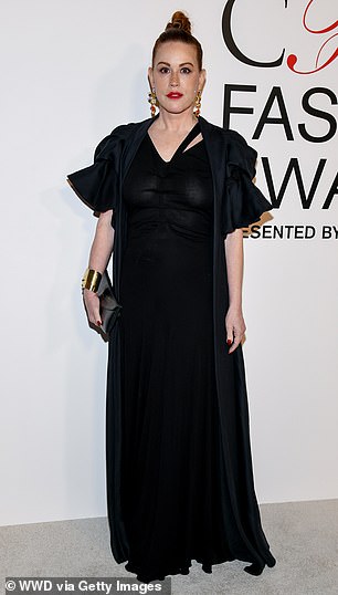 Molly Ringwald was also seen at the event, and donned a fitted, black dress as well as a short-sleeved, black outer piece on top