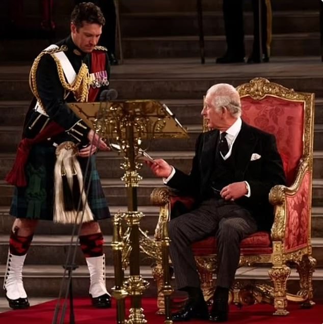 Major Thompson assisting King Charles at his Coronation in May 2023