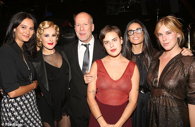 Emma said it was difficult to pinpoint exactly when his disease symptoms began; he's seen with Emma (L), ex-wife Demi Moore (second to right) and daughters (L–R) Rumer, Tallulah and Scout