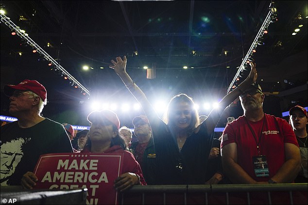 Supporters listen as Republican presidential nominee former President Donald Trump speaks at a campaign rally at PPL Center, Tuesday, Oct. 29, 2024, in Allentown, Pa