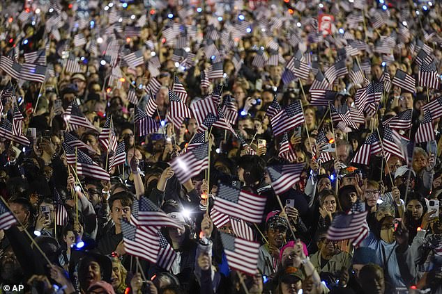 Throngs of Harris supporters were packed onto the Ellipse and waved American flags Tuesday night in Washington, D.C.