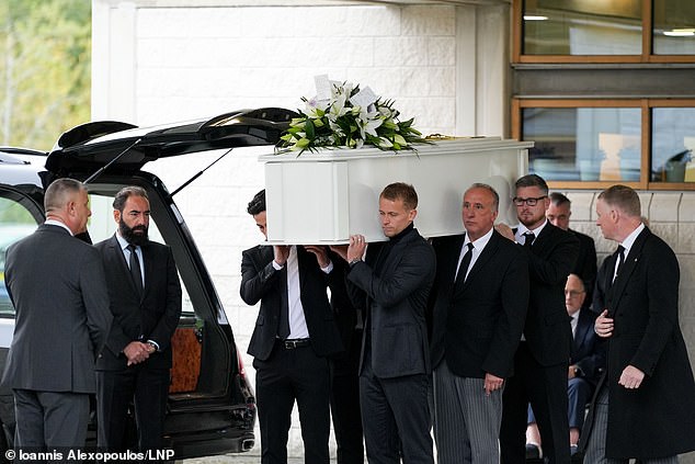 Pallbearers pictured carrying the coffin of Baldock at the ceremony in Milton Keynes