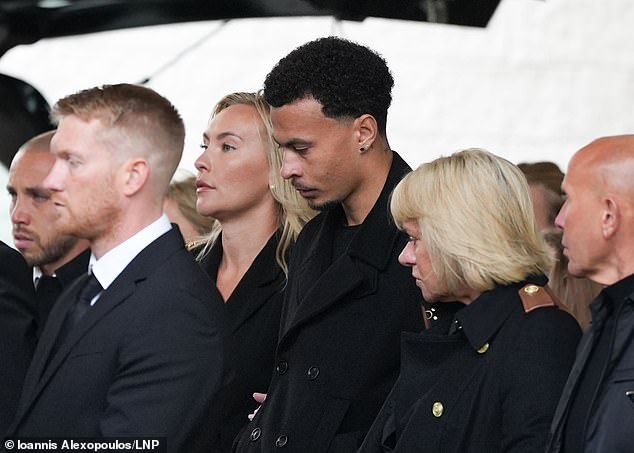 The former England star bowed his head as he paid tribute to his former MK Dons team-mate