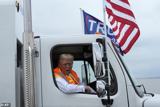 'How do you like my garbage truck? This truck is in honor of Kamala and Joe Biden,' he told reporters in Green Bay