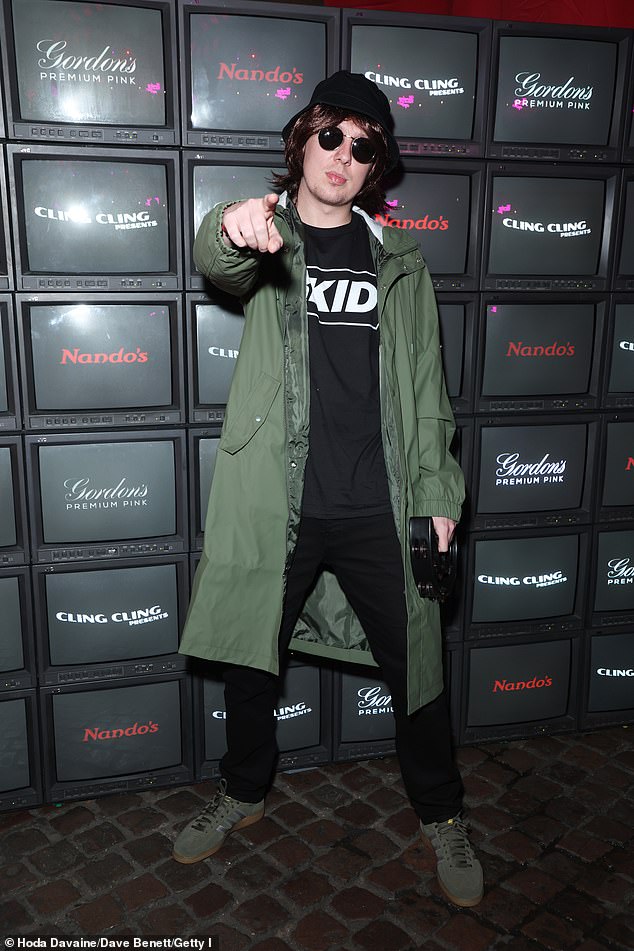 Meanwhile, Aitch switched music genre as he transformed into Liam Gallagher, sporting an oversized green coat, black bucket hat, and circular sunglasses