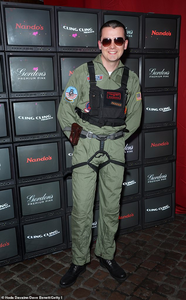 He was joined by Sex Education star Asa Butterfield, who cut a dapper figure in a Top Gun inspired costume