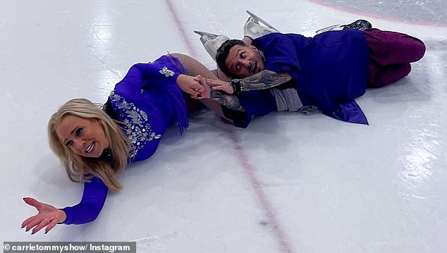 Carrie channelled Torvill in a beaded blue mini dress and tights, while Tommy dressed as Christopher in a blue shirt and purple trousers