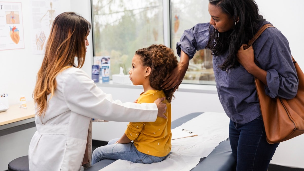 Girl at doctor