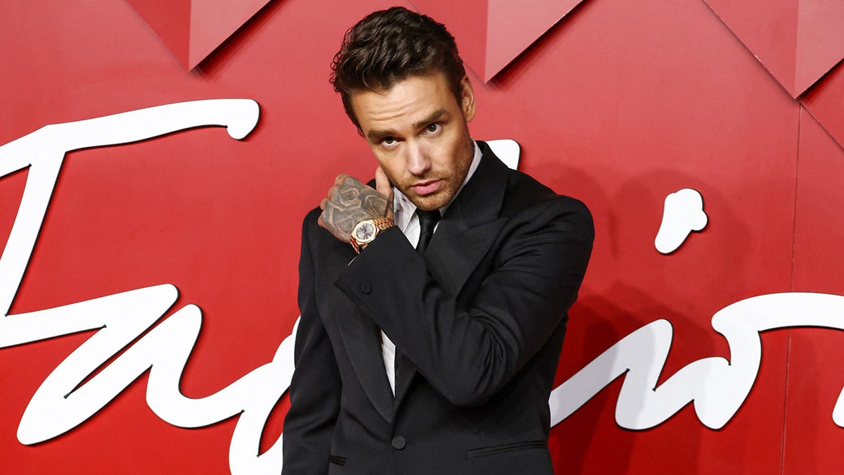 Liam Payne poses on the red carpet