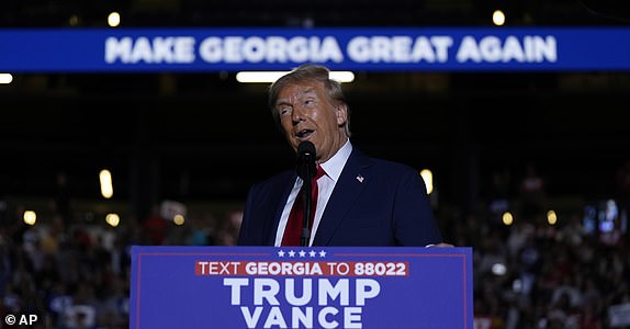 Republican presidential nominee former President Donald Trump speaks at a campaign rally at McCamish Pavilion Monday, Oct. 28, 2024, in Atlanta, Ga. (AP Photo/Julia Demaree Nikhinson)