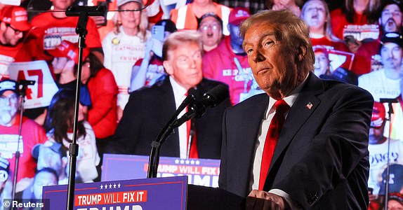 Republican presidential nominee and former U.S. President Donald Trump holds a campaign rally at Macomb Community College in Warren, Michigan, U.S., November 1, 2024. REUTERS/Brian Snyder