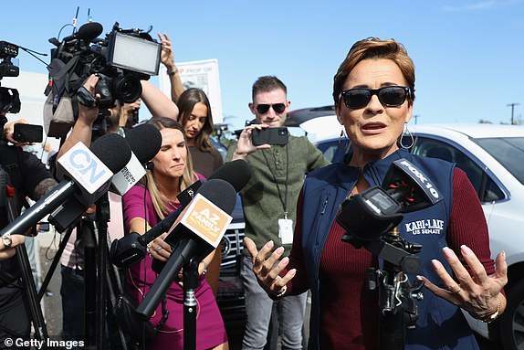 MESA, ARIZONA - NOVEMBER 05: Arizona Republican U.S. Senate candidate Kari Lake speaks with the media outside the Mesa Convention Center polling place on November 05, 2024 in Mesa, Arizona. Americans cast their ballots today in the presidential race between Republican nominee former President Donald Trump and Democratic nominee Vice President Kamala Harris, as well as multiple state elections that will determine the balance of power in Congress. (Photo by Christian Petersen/Getty Images)