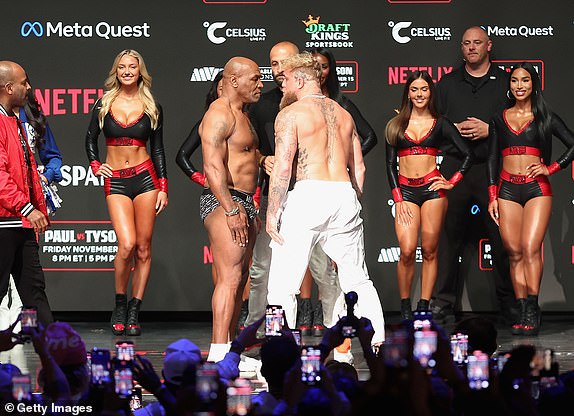 IRVING, TEXAS - NOVEMBER 14: Mike Tyson and Jake Paul face off during their ceremonial weigh-in at The Pavilion at Toyota Music Factory on November 14, 2024 in Irving, Texas. The two are scheduled to meet in a heavyweight bout on November 15 at AT&T Stadium in Arlington, Texas. (Photo by Christian Petersen/Getty Images)