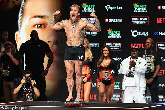 IRVING, TEXAS - NOVEMBER 14: Jake Paul poses on the scale during his ceremonial weigh-in at The Pavilion at Toyota Music Factory on November 14, 2024 in Irving, Texas. Paul will meet Mike Tyson in a heavyweight bout on November 15 at AT&T Stadium in Arlington, Texas. (Photo by Christian Petersen/Getty Images)