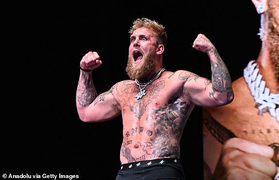 IRVING, TEXAS - NOVEMBER 14: Jake Paul gets on scale during Weigh-In at the Toyota Music Factory in Irving, Texas on November 14, 2024 ahead of his match with Mike Tyson for heavyweight world titles of the Premiere Boxing Championship which will be on November 15 Friday night at AT&T Stadium in Arlington, Texas, United States. (Photo by Tayfun Coskun/Anadolu via Getty Images)