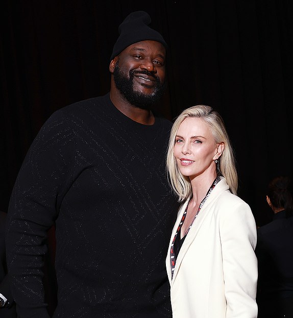 ARLINGTON, TEXAS - NOVEMBER 15: (L-R) Shaquille O'Neal and Charlize Theron attend LIVE On Netflix: Jake Paul vs. Mike Tyson at AT&T Stadium on November 15, 2024 in Arlington, Texas. (Photo by Matt Winkelmeyer/Getty Images for Netflix Â© 2024)