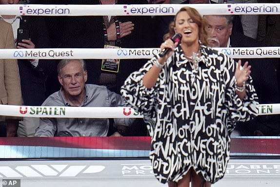 Texas governor Greg Abbott before a heavyweight boxing match between Mike Tyson and Jake Paul, Friday, Nov. 15, 2024, in Arlington, Texas. (AP Photo/Julio Cortez)