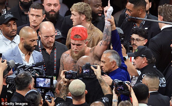 ARLINGTON, TEXAS - NOVEMBER 15: Jake Paul celebrates after his unanimous-decision win during a heavyweight bout against Mike Tyson at AT&T Stadium on November 15, 2024 in Arlington, Texas. (Photo by Christian Petersen/Getty Images)