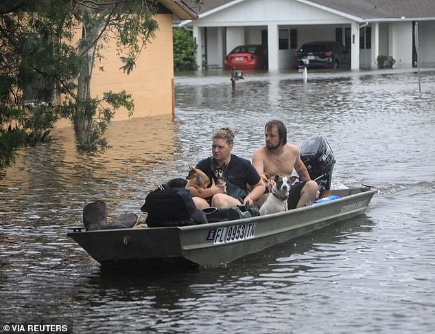 Hurricane Milton which killed 35 people in the US and Mexico. Pictured, residents and their pets evacuate in South Daytona, Florida, October 10, 2024