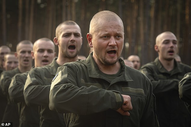 Ukraine has a dire need for fresh recruits after tens of thousands of soldiers have been killed and many more wounded since Russia started the war in 2022. Pictured above: new recruits in 2023