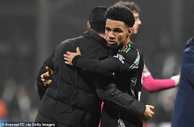 Nwaneri - pictured hugging his manager Arteta - is a quiet, humble character around Arsenal