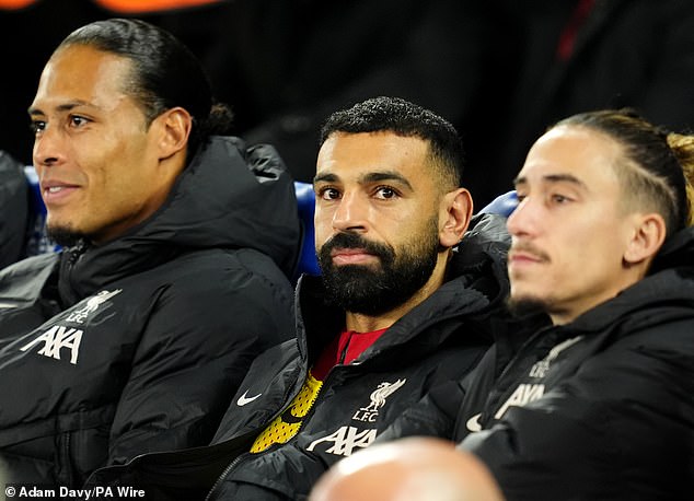 Slot has insisted that the Virgil van Dijk (left) , Mohamed Salah (middle) and Trent Alexander-Arnold are all in a good place amid ongoing contract negotiations