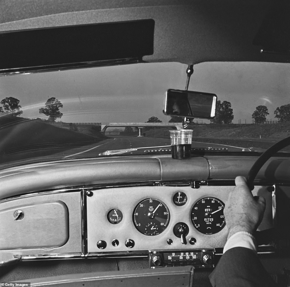 This is a driver's eye view from inside a car travelling along the first stretch of the new M1 motorway. Lighting wasn't added to the M1 until 1973, along with the first crash barriers