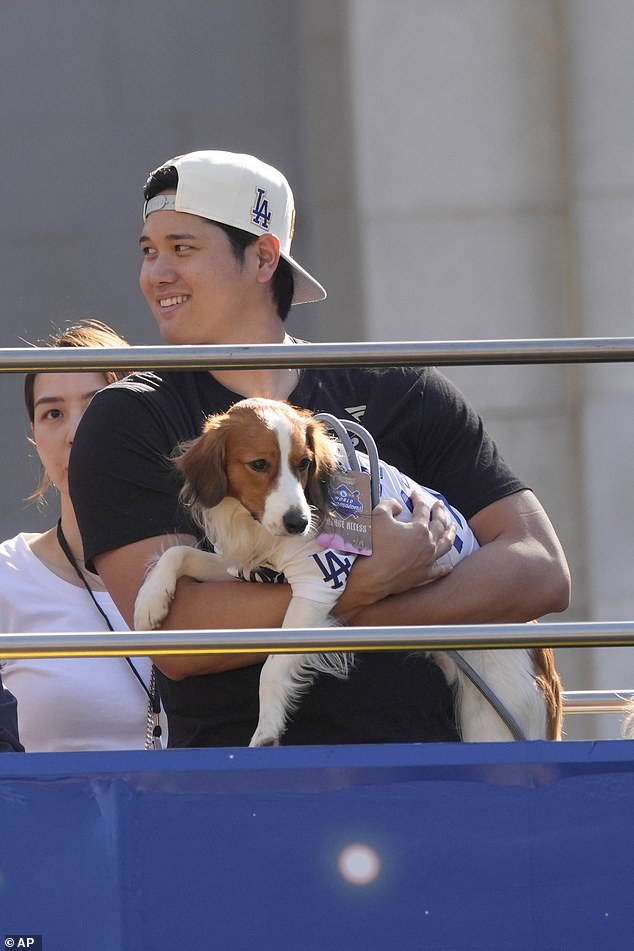 Fans lined up along the streets of Los Angeles for their first World Series parade since 1988