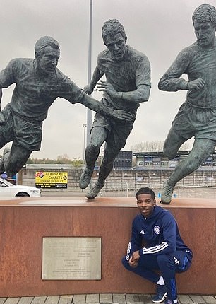 His Curzon Ashton play their football next to a statue of English legend of 1966 Sir Geoff Hurst