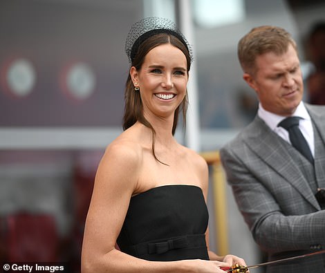 The retired Olympic swimmer looked dazzling in her black designer frock just moments before it exploded all over her