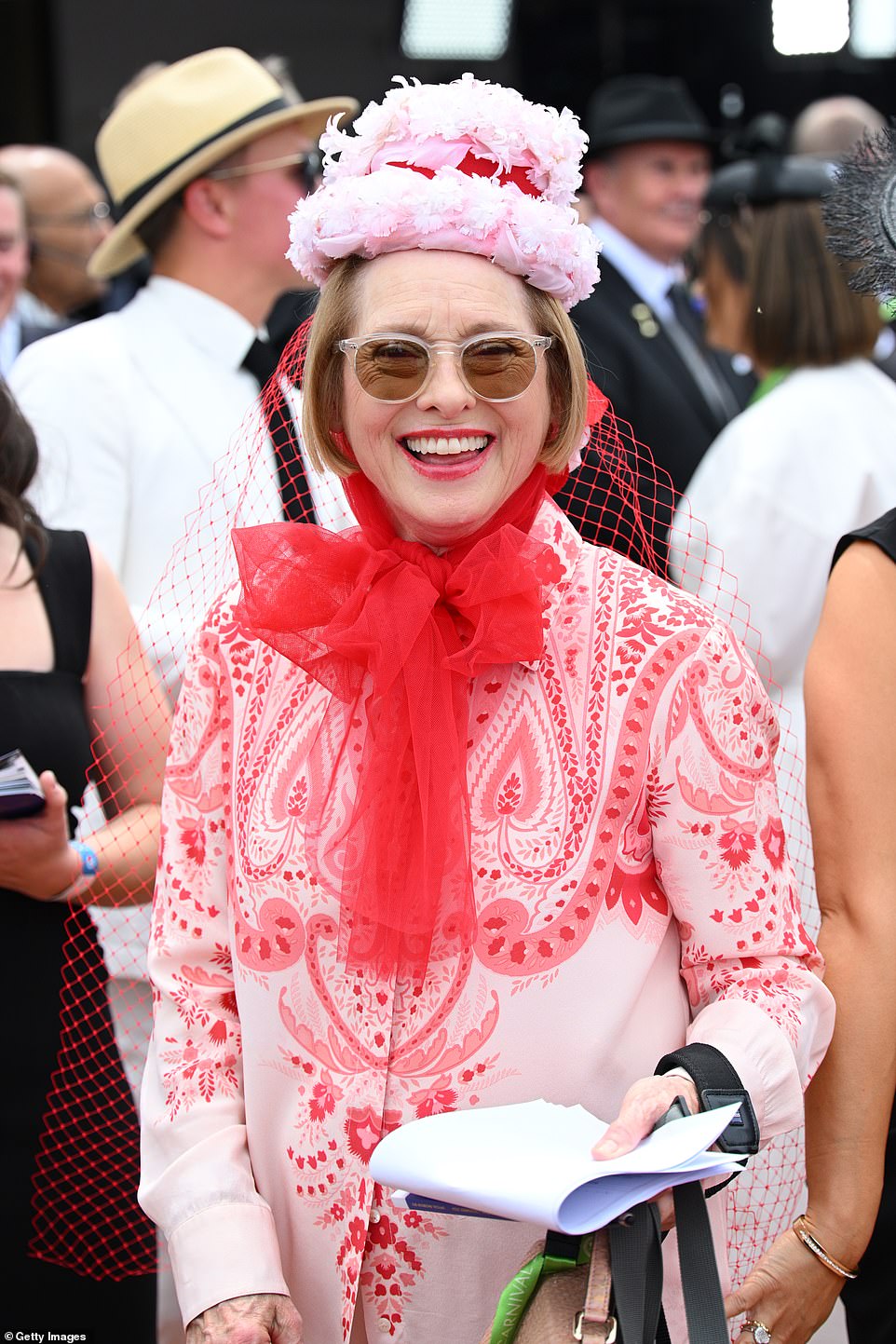 Horse trainer Gai Waterhouse (pictured) eschewed tradition and opted for a very bright pink ensemble during Derby Day, which typically requires attendees to wear black and white