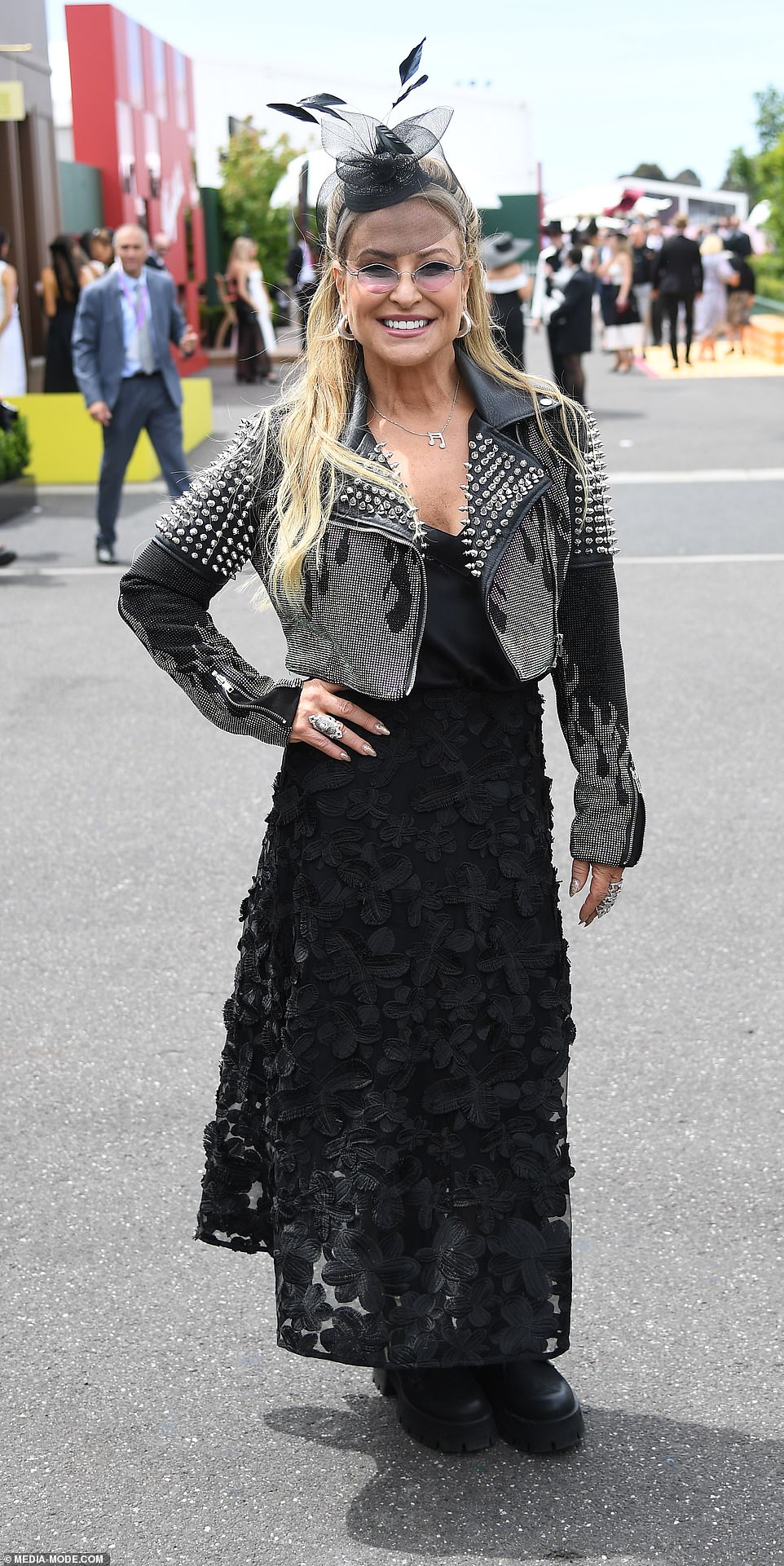 American pop icon Anastacia (pictured) made a shock arrival at Derby Day wearing a studded leather jacket