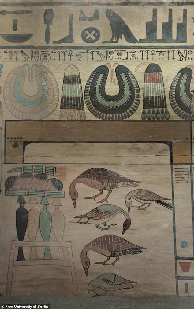 Pictured, a close-up of the outer coffin of Idy, showing remarkable illustrations that were made nearly 4,000 years ago