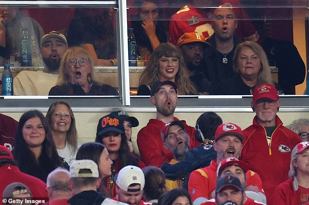 On Monday night, Swift sat between Kelce's mom Donna (left) and her own mom Andrea (right)