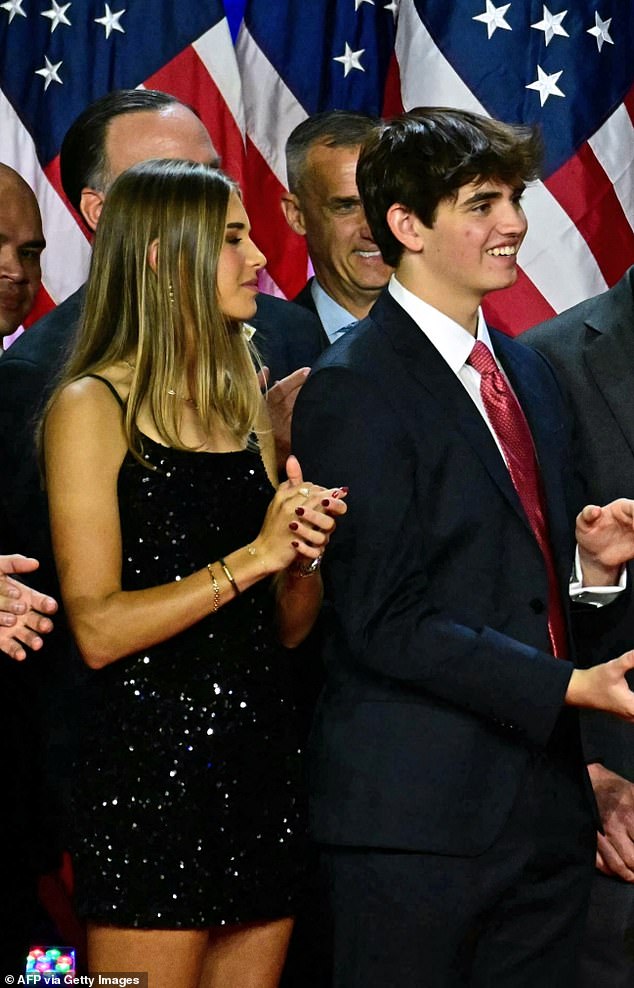 Donald Trump III, 15, is pictured next to his sister Kai during an election night event at the West Palm Beach Convention Center