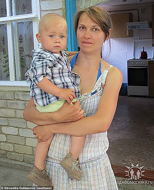 Alexandra Gabbasova, 48, pictured with her son when he was a toddler