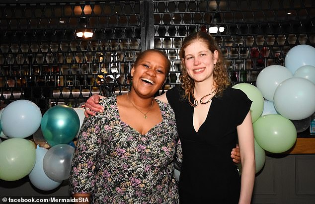 Lady Louise is pictured with a friend at a University society event