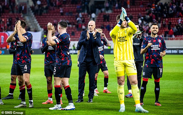 Skipper Jack Butland and players applaud the travelling Rangers contingent