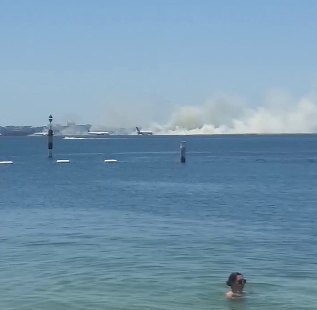 Huge clouds of smoke could be seen billowing above the airport as NSW Fire Service crews fought to get the blaze under control